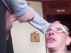 Bald headed female slave gets a rough facefuck